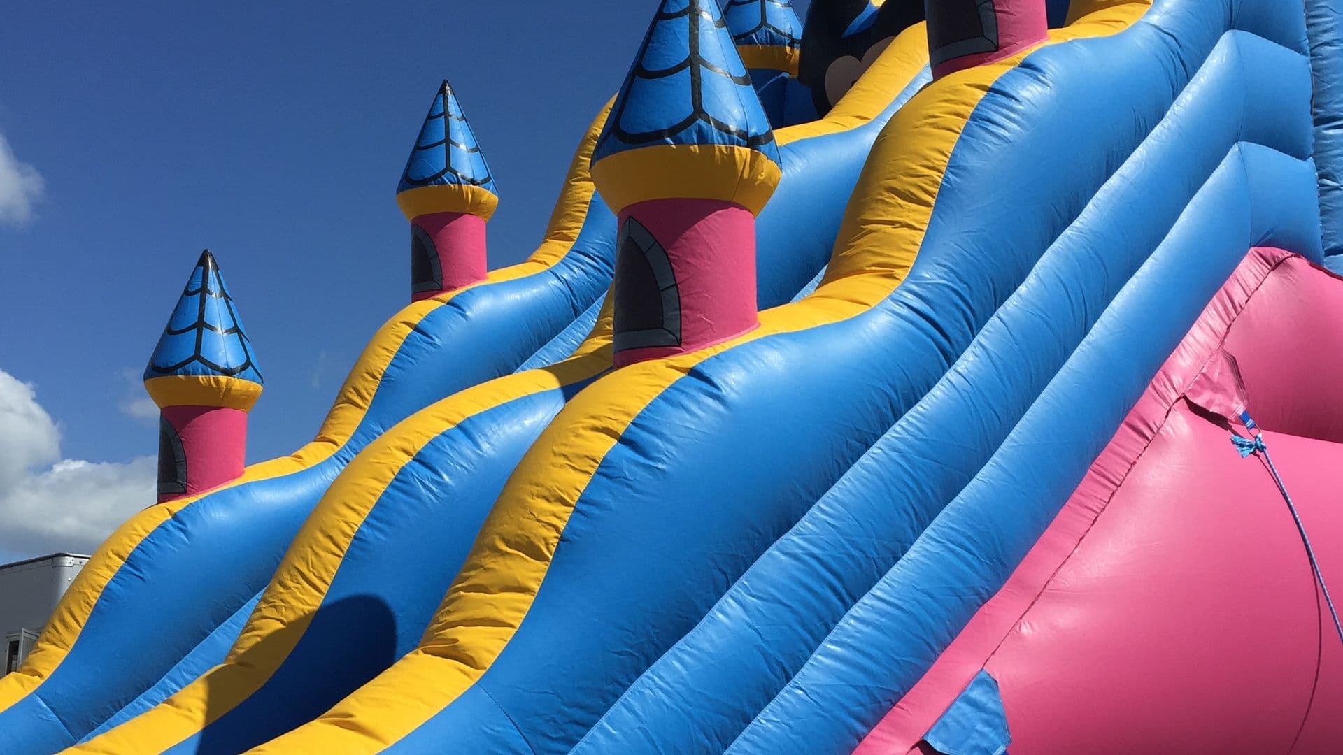 Colourful jumping castle at a kids party