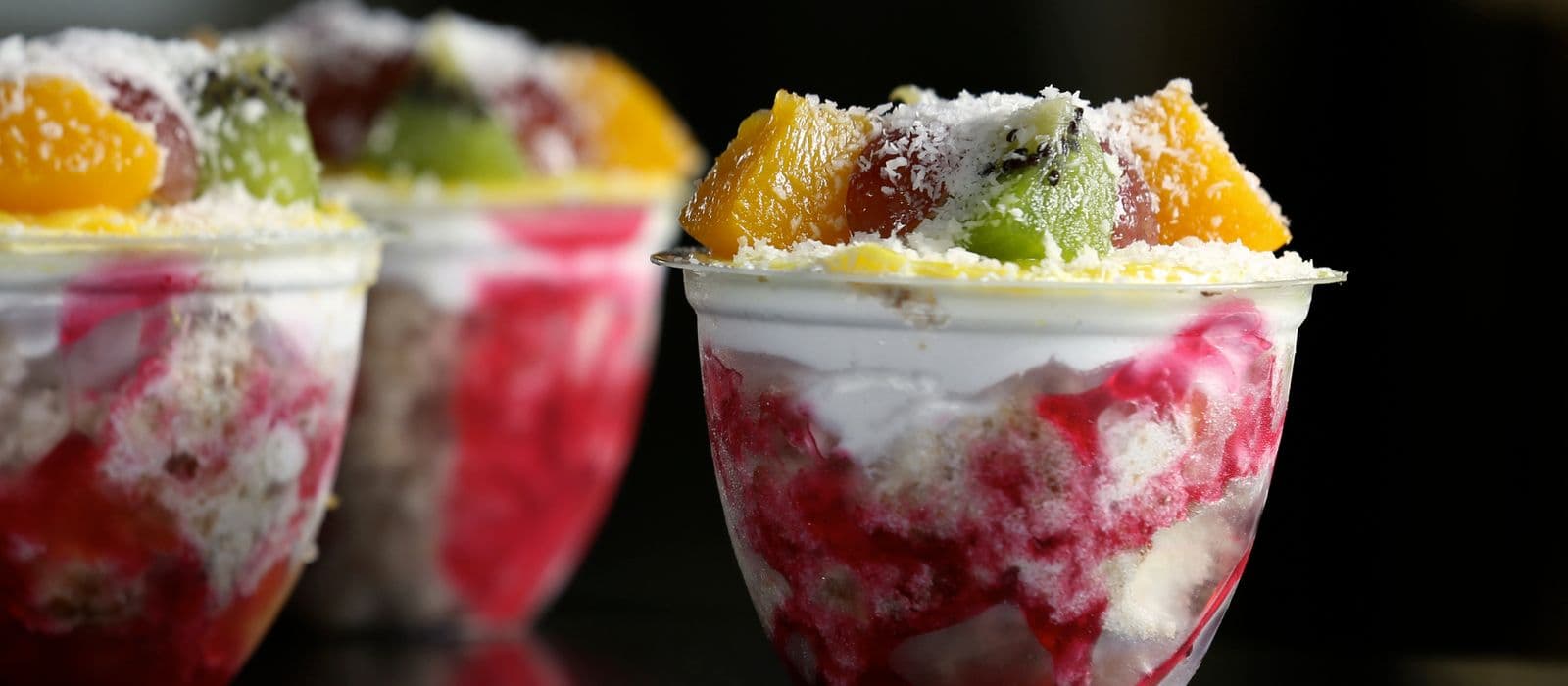 Colourful frozen yoghurt cups